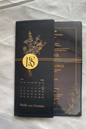 Transparent card with black cover and gold paper tag