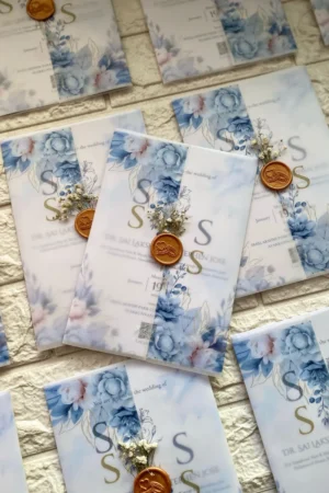 Floral card with buttersheet , wax seal and fresh flower
