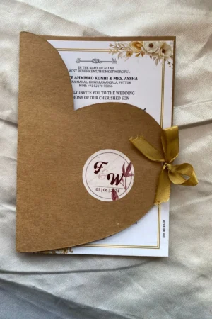 Craft paper card with bow and round sticker