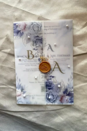 Floral card with buttersheet, wax seal. fresh flower and white pearl