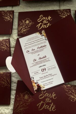 maroon color envelope with round tag