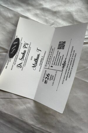 Offwhite envelope card with round tag