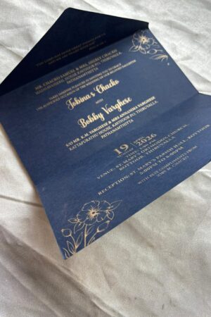 Blue color folding card with round sticker.
